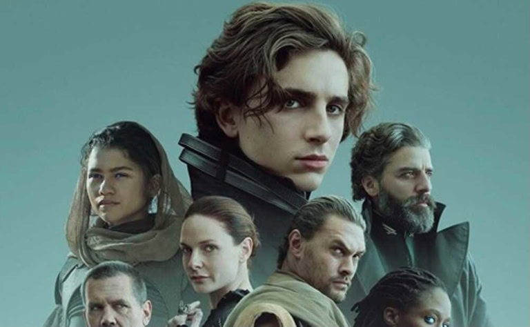 A young man with wavy hair and intense expression, surrounded by diverse characters in a sci-fi sett.