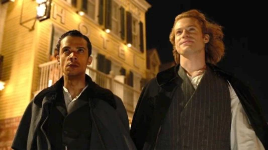  Louis (Jacob Anderson) and Lestat (San Reid) 