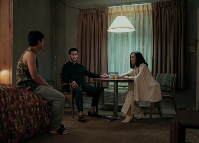 Sam Song Li as Bruce Sun, Justin Chien as Charles Sun, Michelle Yeoh as Mama Sun in The Brothers Sun.