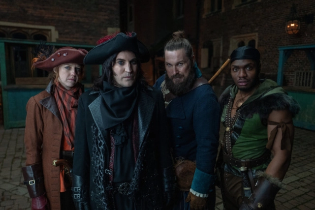 Group photo of Essex gang, (L to R) Ellie White as Nell Brazier, Noel Fielding as Dick Turpin, Marc Wootton as Moose Pleck, and Duayne Boachie as Honesty Courage