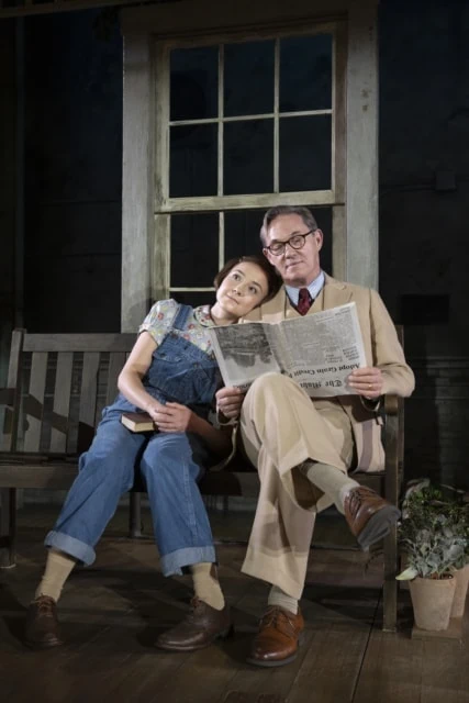 Scout and Atticus in To Kill a Mockingbird