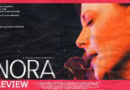 Anna Campbell in Nora (2025) movie review banner