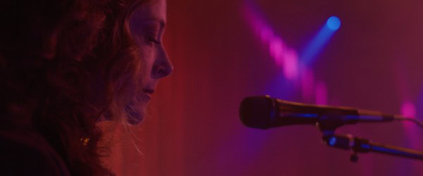 Anna Campbell as Nora in Nora (2025)