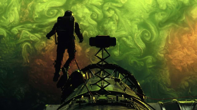 Extraterrestrial planet with astronaut floating in front of it