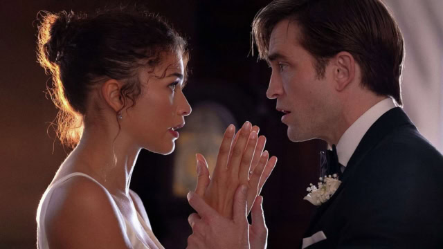 The Drama starring Robert Pattinson and Zendaya. Elegant couple dancing closely at a formal event, romantic atmosphere, evening setting.