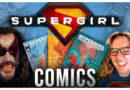 Supergirl: Woman of Tomorrow comics featuring a superhero emblem and two men, one with face paint and glasses. Inspired by the new Supergirl movie
