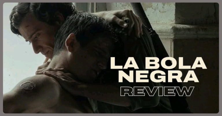 La Bola Negra movie review still with two men embracing in dim light.